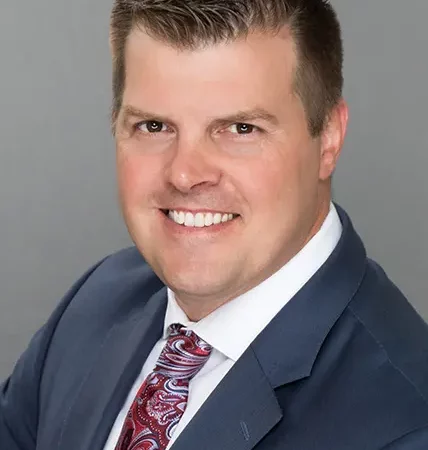 Headshot of DebtBlue Chairman and CEO, Corey Butcher