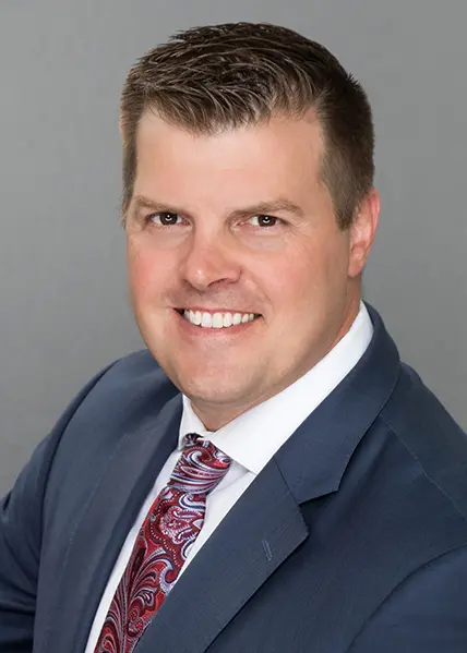 Headshot of DebtBlue Chairman and CEO, Corey Butcher